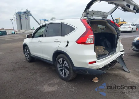 2016 Honda Cr-V Touring z USA, uszkodzony, nr VIN 5J6RM4H98GL140550